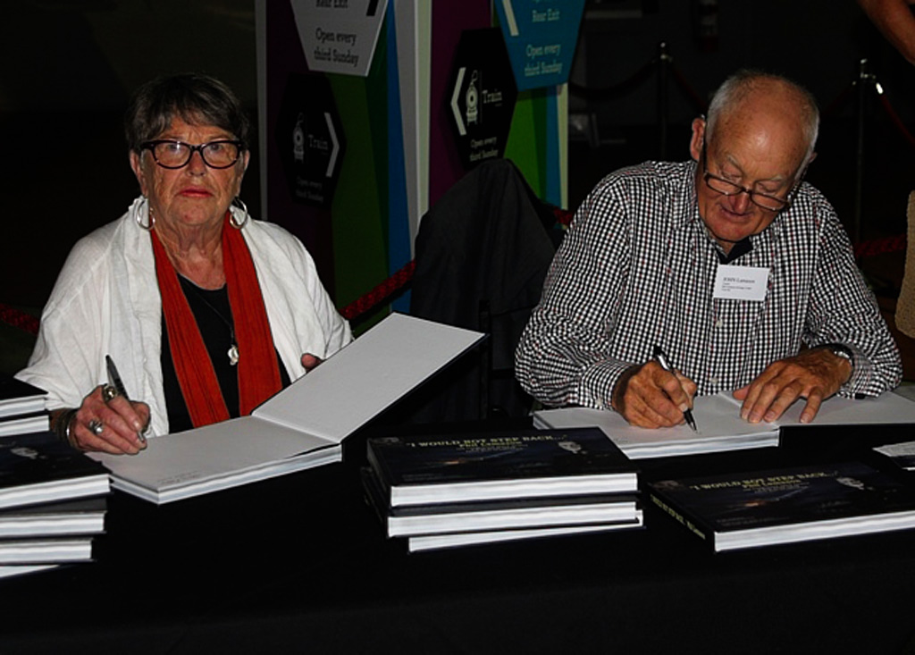 Writer Hilary Pedersen and John Lamason (Son of Phil Lamason) signing books at the MOTAT book launch, Auckland, March 2018.